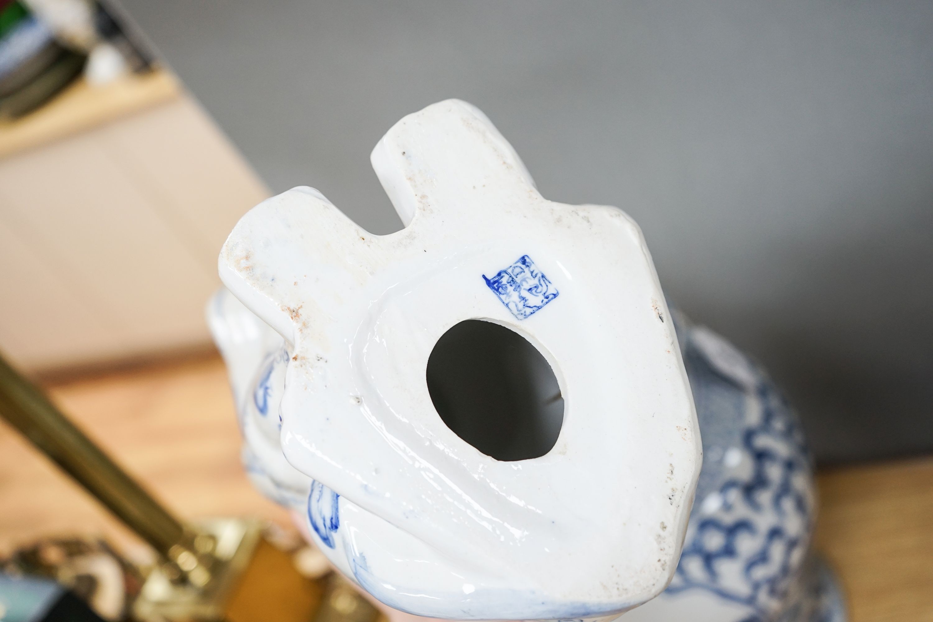 2 modern Chinese blue and white vases and covers and a similar model of a dog.